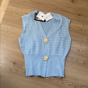 Light Blue Sleeveless vest top with Gold Buttons